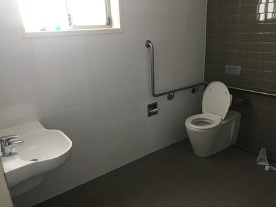 Support features in bathroom in self-contained unit in Lifestyle Solutions Specialist Disability Accommodation in Argenton, Newcastle, NSW