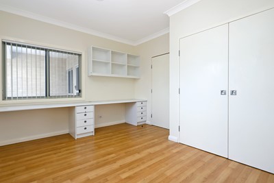 Bedroom with fitted wardrobe and storage space in villa in Lifestyle Solutions Supported Independent Living property with five self-contained villas in Quakers Hill, Sydney
