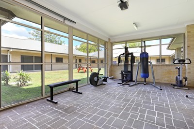 Shared gym in Lifestyle Solutions Supported Independent Living property with five self-contained villas in Quakers Hill, Sydney