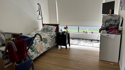 Bedroom with disability aids in Lifestyle Solutions three-bedroom Specialist Disability Accommodation in Pallara, Qld