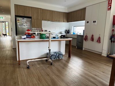 Fully accessible kitchen in Lifestyle Solutions three-bedroom Specialist Disability Accommodation (SDA) in Pallara, Qld