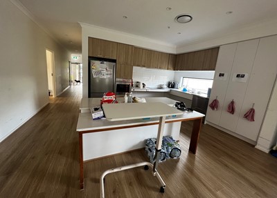 Fully accessible kitchen in Lifestyle Solutions three-bedroom Specialist Disability Accommodation (SDA) in Pallara, Qld
