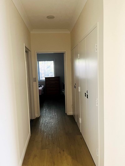 Hallway in villa showing storage space in Lifestyle Solutions Supported Independent Living property with five self-contained villas in Quakers Hill, Sydney