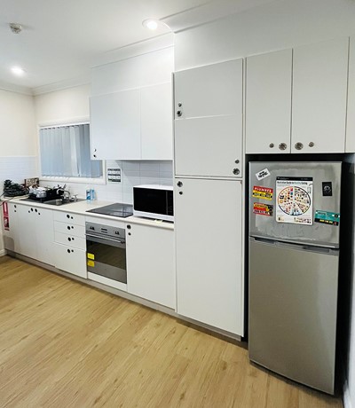 Kitchen in villa in Lifestyle Solutions Supported Independent Living property with five self-contained villas in Quakers Hill, Sydney