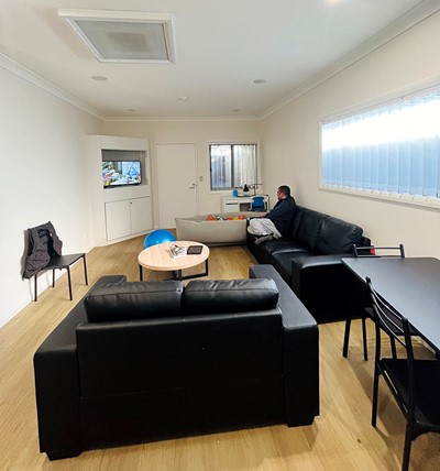 Shared living room and dining area in Lifestyle Solutions Supported Independent Living property with five self-contained villas in Quakers Hill, Sydney