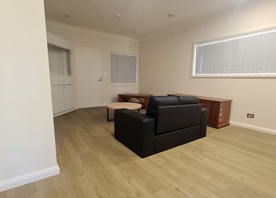 Living room in villa in Lifestyle Solutions Supported Independent Living property with five self-contained villas in Quakers Hill, Sydney