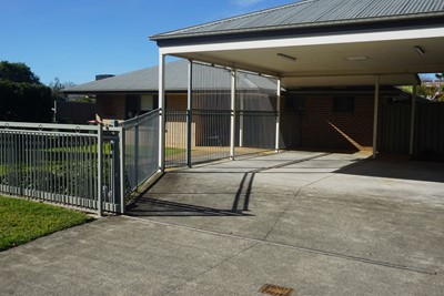 Covered on site parking area  at Lifestyle Solutions Supported Independent Living property in Wyong, NSW