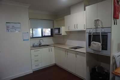 Kitchen area in self-contained apartment at Lifestyle Solutions Supported Independent Living property in Wyong, NSW