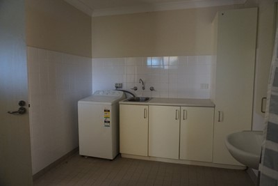 Laundry area and sink in bathroom/laundry in self-contained apartment  at Lifestyle Solutions Supported Independent Living property in Wyong, NSW