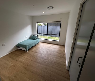 Light, airy accessible vacant bedroom in Lifestyle Solutions three-bedroom Specialist Disability Accommodation (SDA) in Pallara, Qld