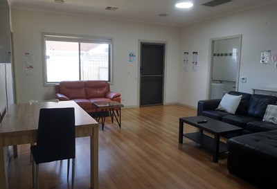 Communal living area in Lifestyle Solutions Supported Independent Living property with two self-contained villas in Fairfield, Sydney