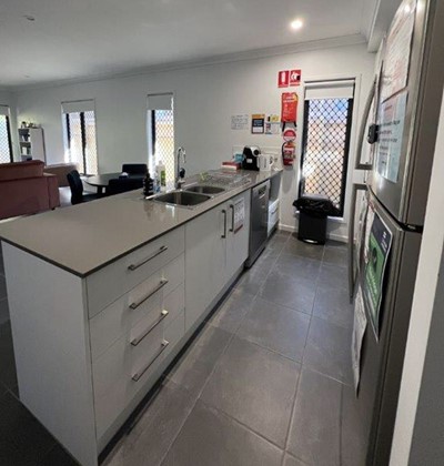 Kitchen in Lifestyle Solutions Supported Independent Living accommodation in Pallara, Qld