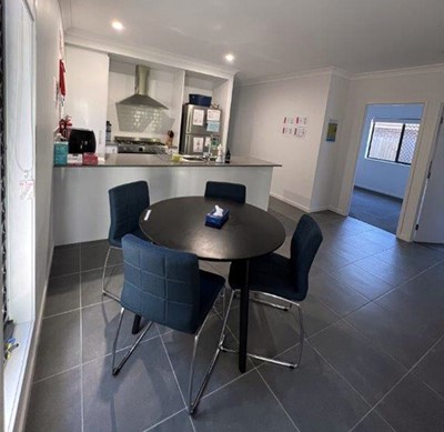 Dining area in Lifestyle Solutions Supported Independent Living accommodation in Pallara, Qld