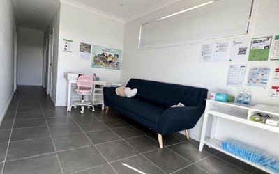 Quiet reading corner in Lifestyle Solutions Supported Independent Living accommodation in Pallara, Qld